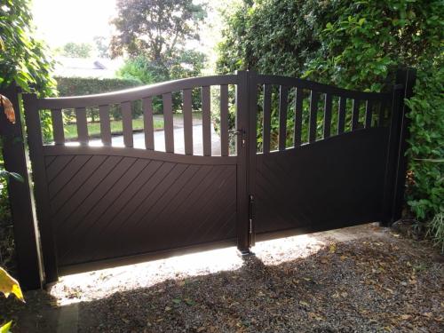 Manual aluminium gate in black with open infill installed in chester by henderson
