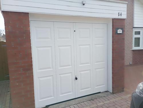 White georgian design up and over garage door installed by henderson in chester
